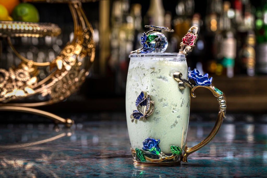 a glass with a liquid in it