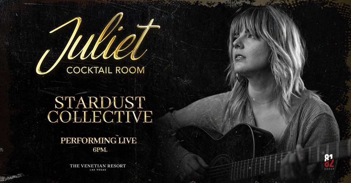 a woman holding a guitar